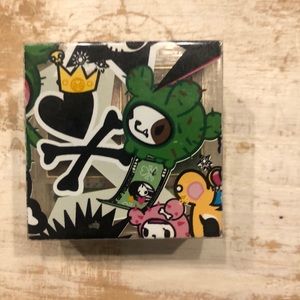 Tokidoki from Sephora - eyeshadow palette. Includes the Bastardini charm.